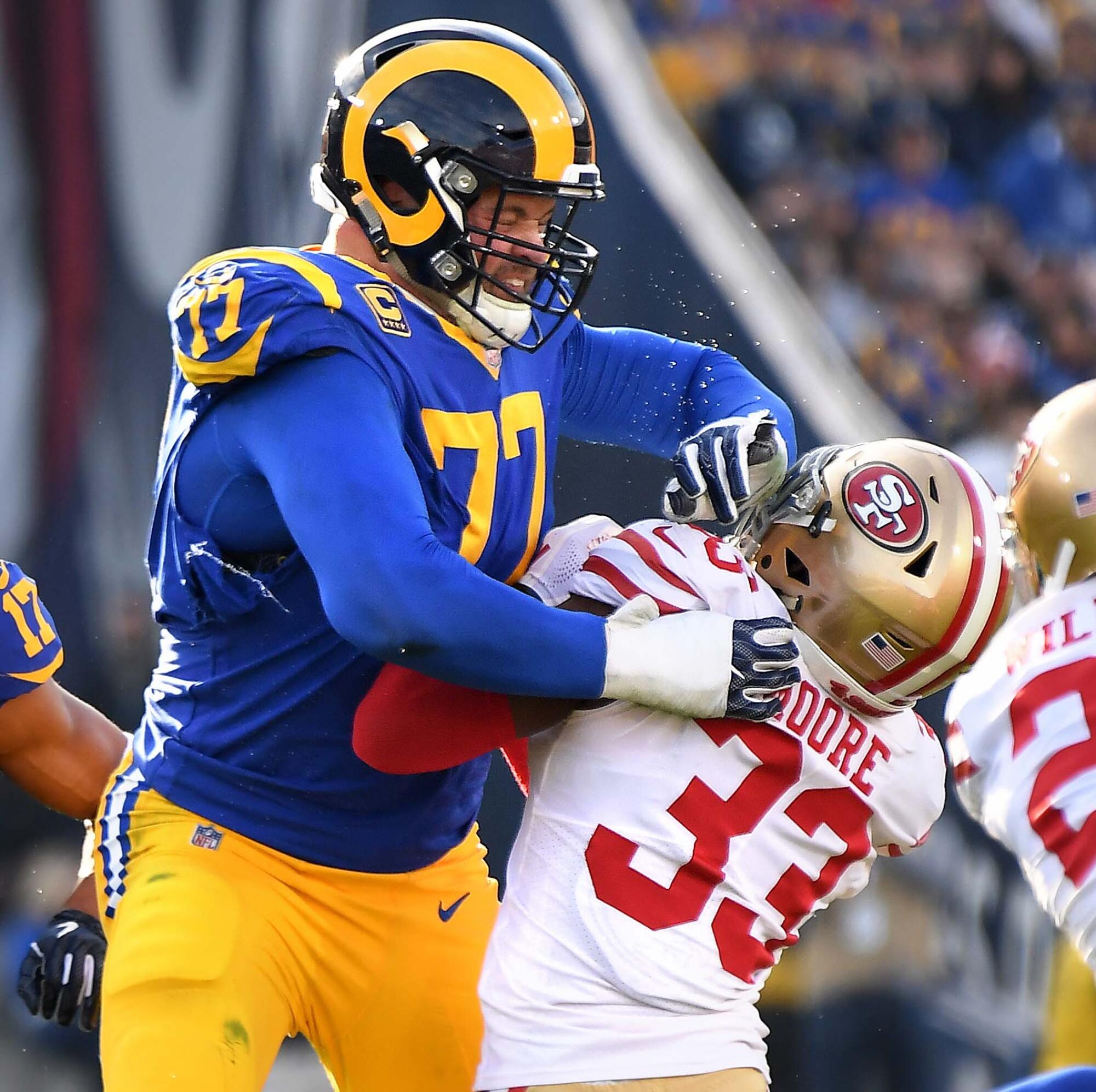 Rams offensive tackle Andrew Whitworth blocks the 49ers' Tarvarius Moore.