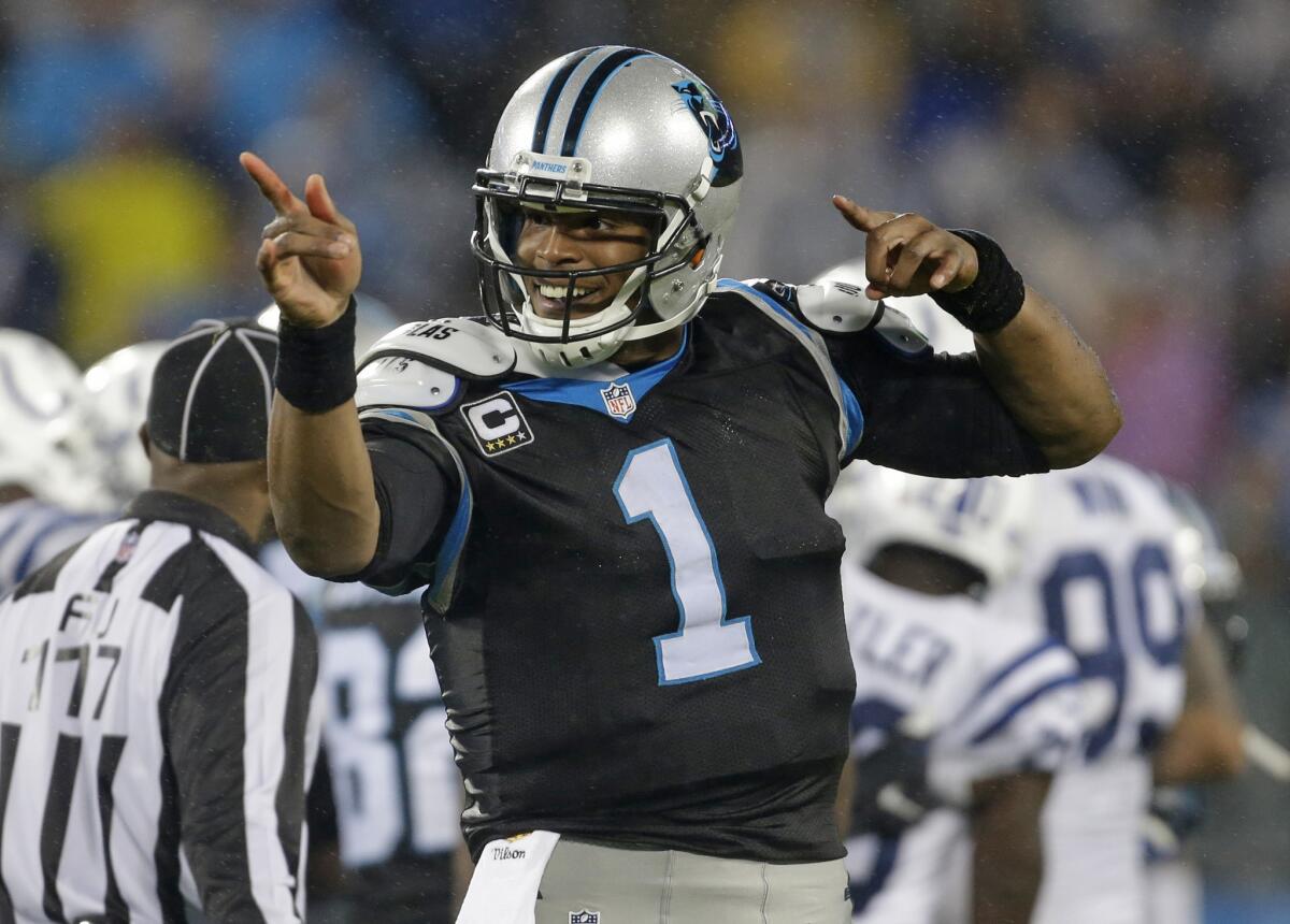 Carolina's Cam Newton celebrates a first down against Indianapolis on Monday night.