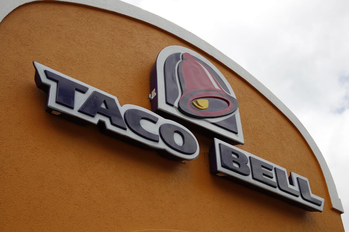 Taco Bell and fellow Yum Brand chain Pizza Hut said Tuesday that they would remove artificial colors and flavors from their menus.