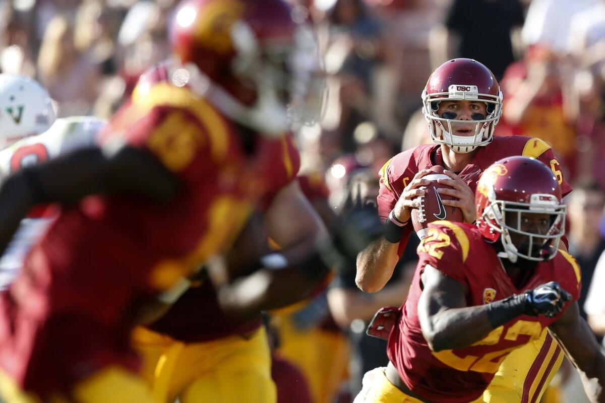 USC quarterback Cody Kessler looks downfield toward receiver Nelson Agholor (15) in the second quarter of a 52-13 victory over Fresno State on Saturday.