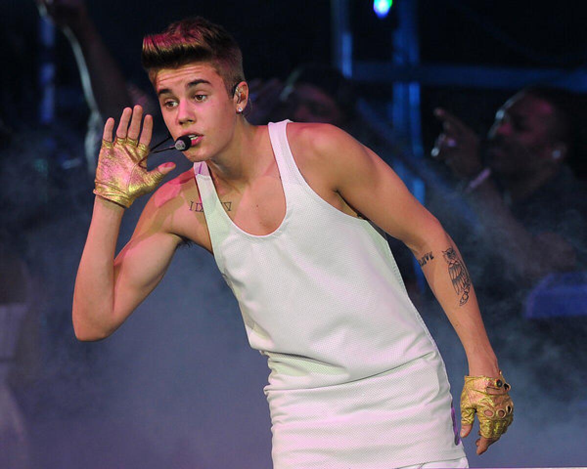Justin Bieber performs on Jan. 13 in Miami. His single "Baby" was awarded 12-times platinum status, the RIAA's highest song certification ever.