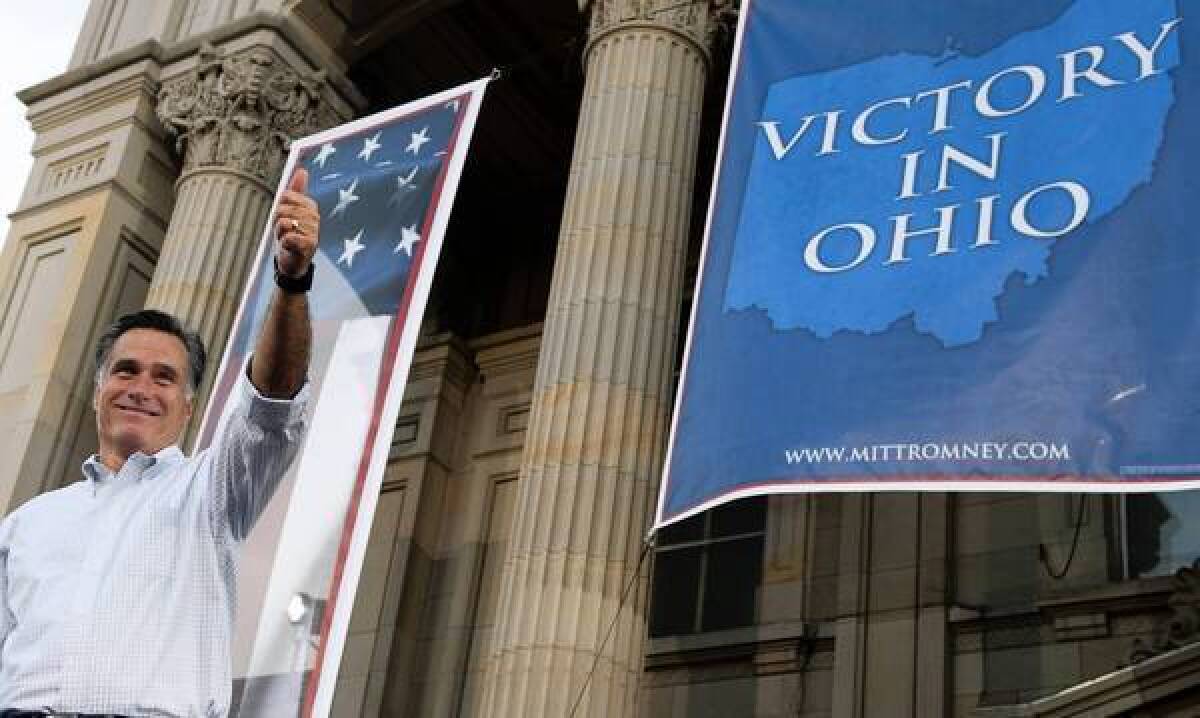 Mitt Romney campaigns in Ohio. Trying to fend off Democrats' criticism of his refusal to release more tax returns, he says his federal tax rate was at least 13% during each of the last 10 years.