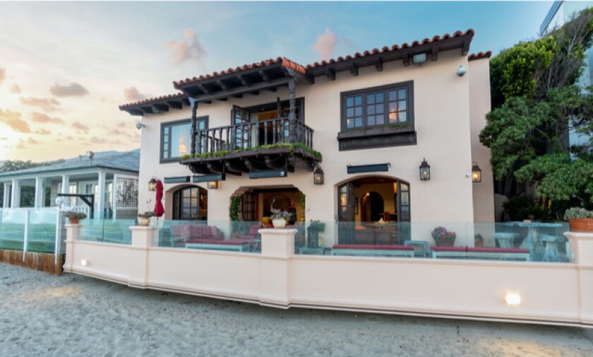 The Billionaires’ Beach villa leads onto the sand.