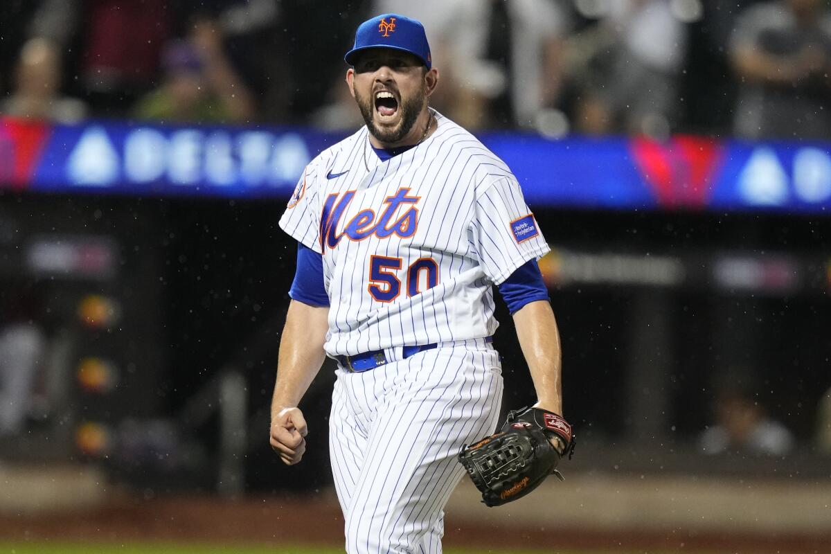 Mets relief pitcher Dominic Leone celebrates after a game against the Brewers on June 27.