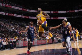 PHILADELPHIA, PA - NOVEMBER 27: LeBron James #23 of the Los Angeles Lakers drives.