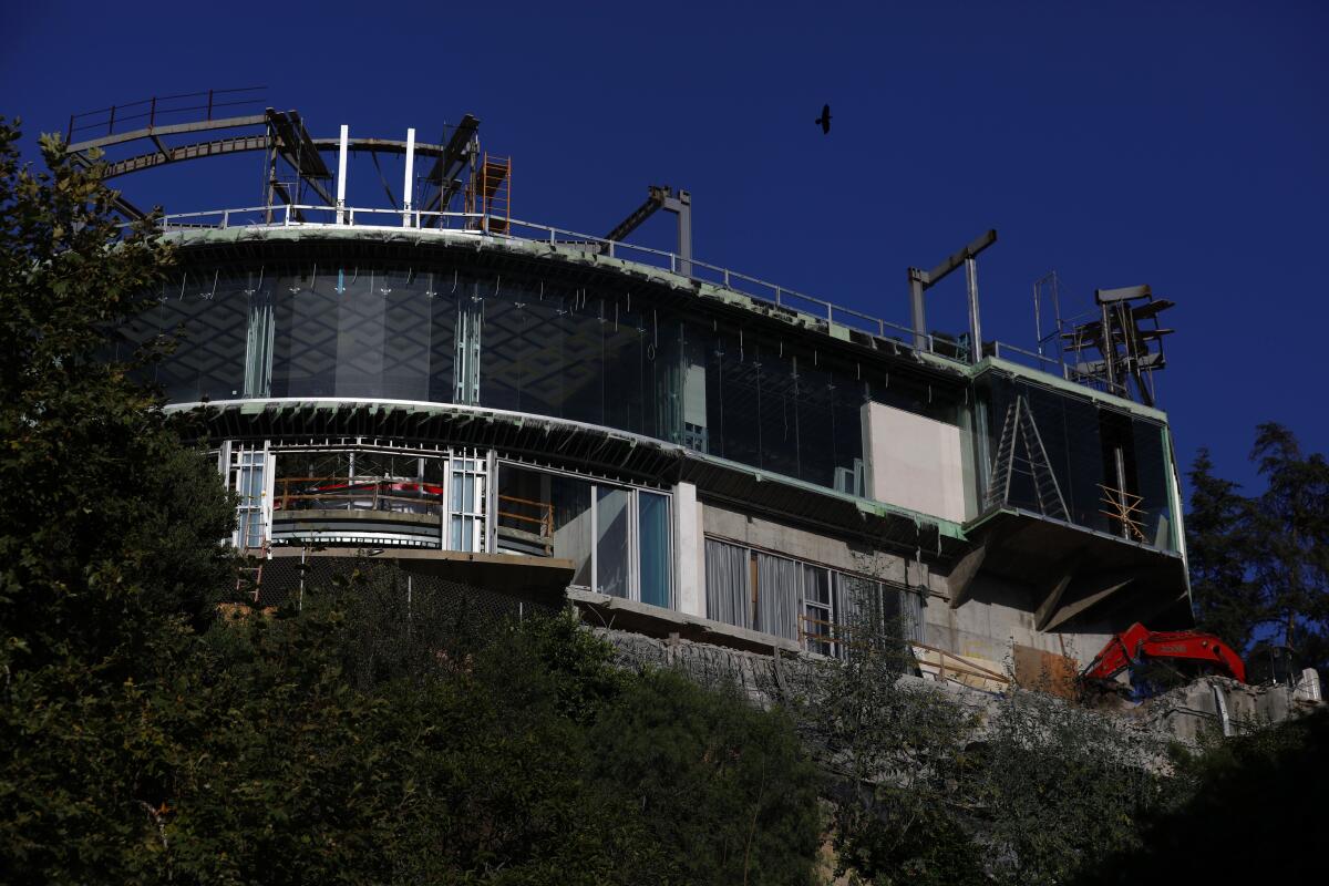 Mohamed Hadid's unfinished mansion in Bel-Air is bigger than city rules allow, officials say. 