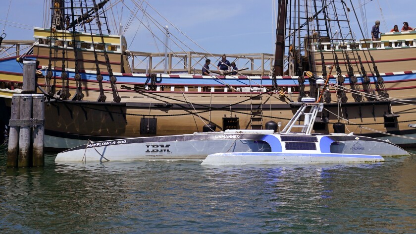 Mayflower Autonomous Ship floats next to the replica of the original Mayflower, Thursday, June 30, 2022, in Plymouth, Mass. The crewless robotic boat retraced the 1620 sea voyage of the Mayflower. (AP Photo/Charles Krupa)