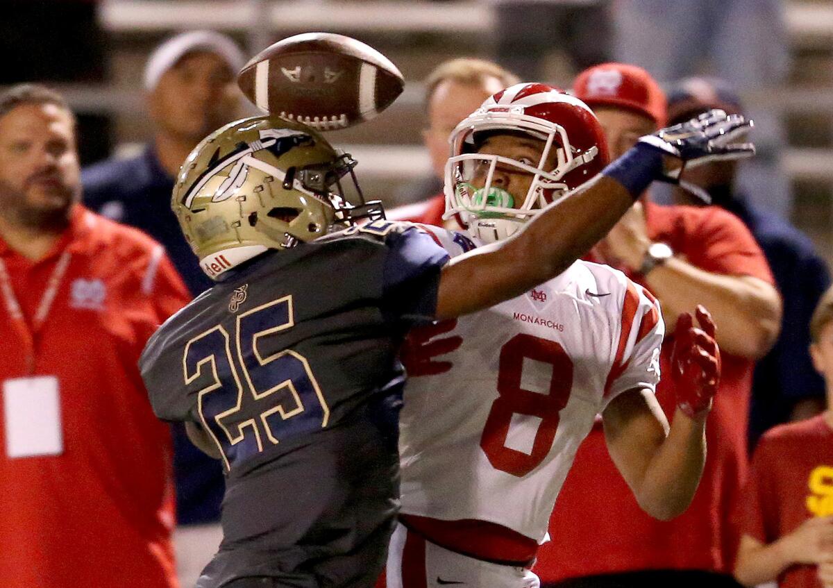 St. John Bosco's Malik Street plays defense against Mater Dei wide receiver Amon-Ra St. Brown in the first half of an Oct. 21 game in which Mater Dei prevailed.