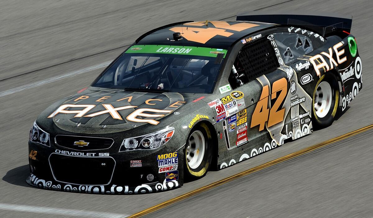 Kyle Larson, driver of the No. 42 AXE Peace Chevrolet, practices for the NASCAR Sprint Cup Series Toyota Owners 400 at Richmond International Raceway on Friday.