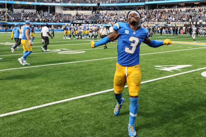 Chargers safety Derwin James Jr. (3) dances off the field after a 22-10 victory over the Raiders.