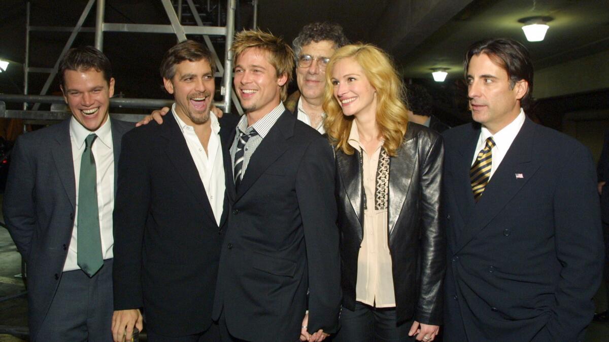 The cast members from Warner Bros. film "Ocean's Eleven" pose for a photo at the film's premiere at Mann's Village Theater in Westwood, Calif., Wednesday Dec. 5, 2001.