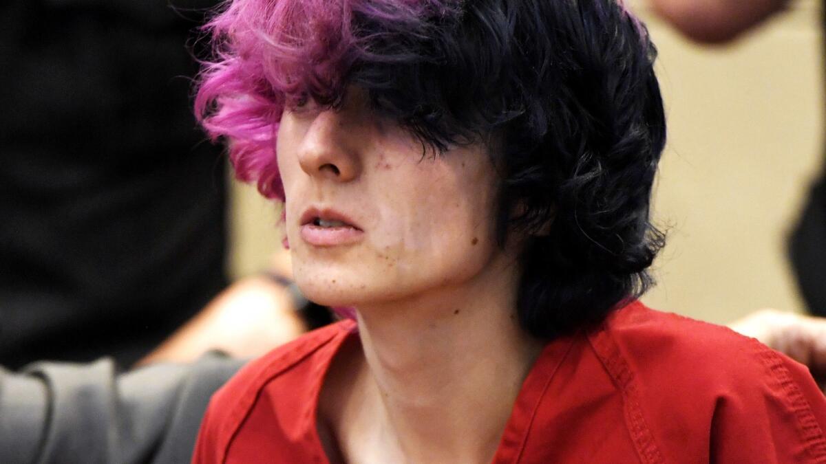 Devon Erickson, 18, accused in a shooting May 7 at a Colorado charter school that left one classmate dead and eight others wounded, appears in court in Castle Rock, Colo., on May 8.