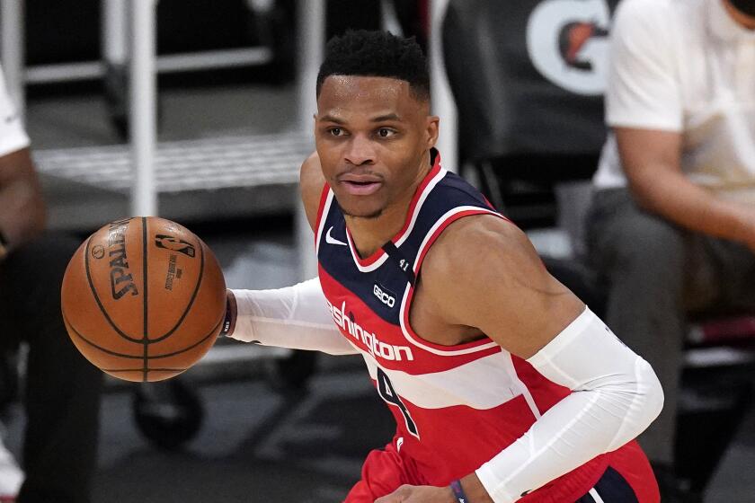 Washington Wizards guard Russell Westbrook dribbles during the second half.