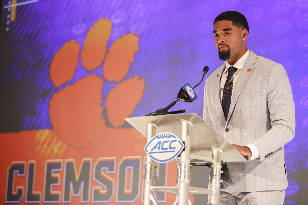Clemson quarterback D.J. Uiagalelei answers a question during an NCAA college football news conference at the Atlantic Coast Conference media days in Charlotte, N.C., Thursday, July 22, 2021. (AP Photo/Nell Redmond)