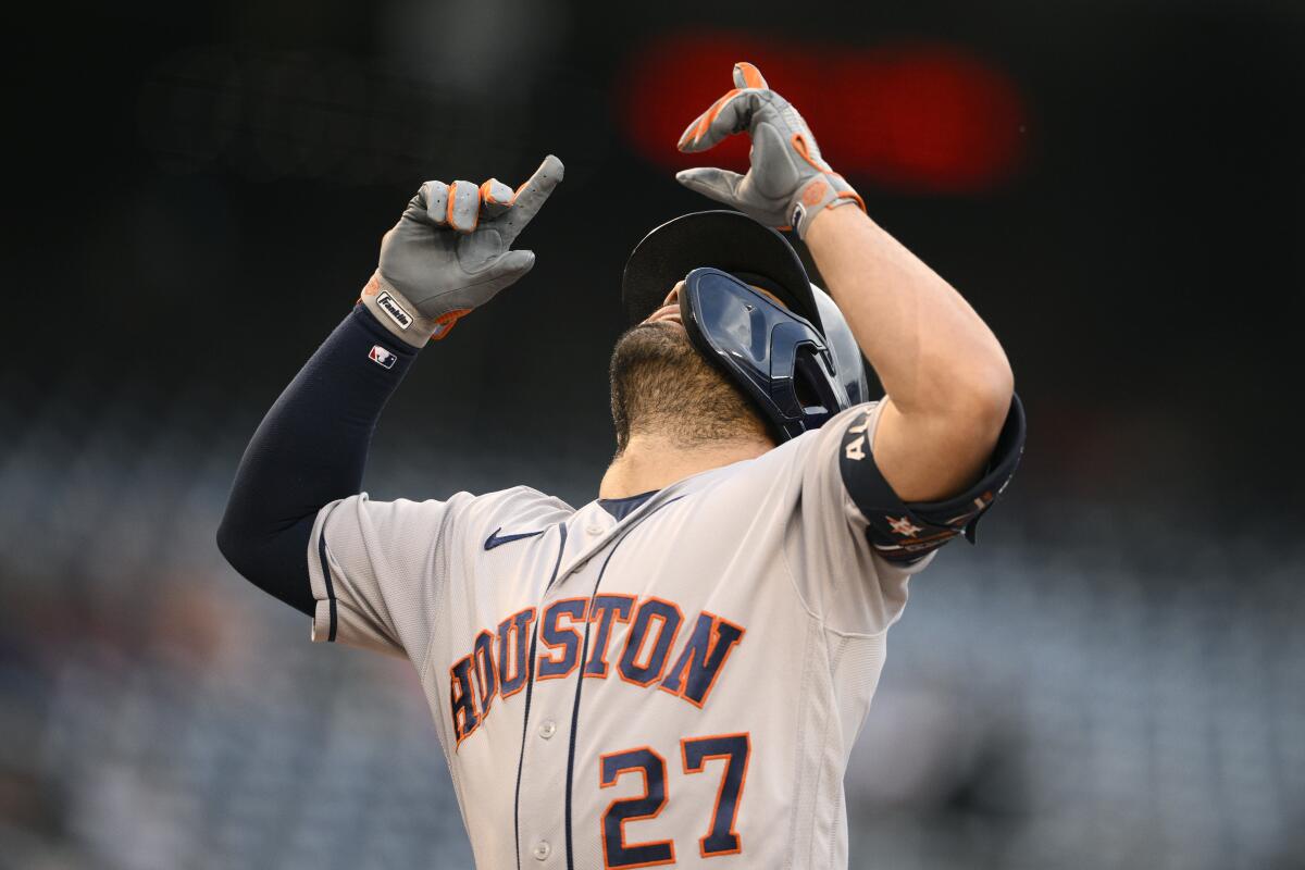 May 7 2022: Houston second baseman Jose Altuve (27) gets a hit during the  game with