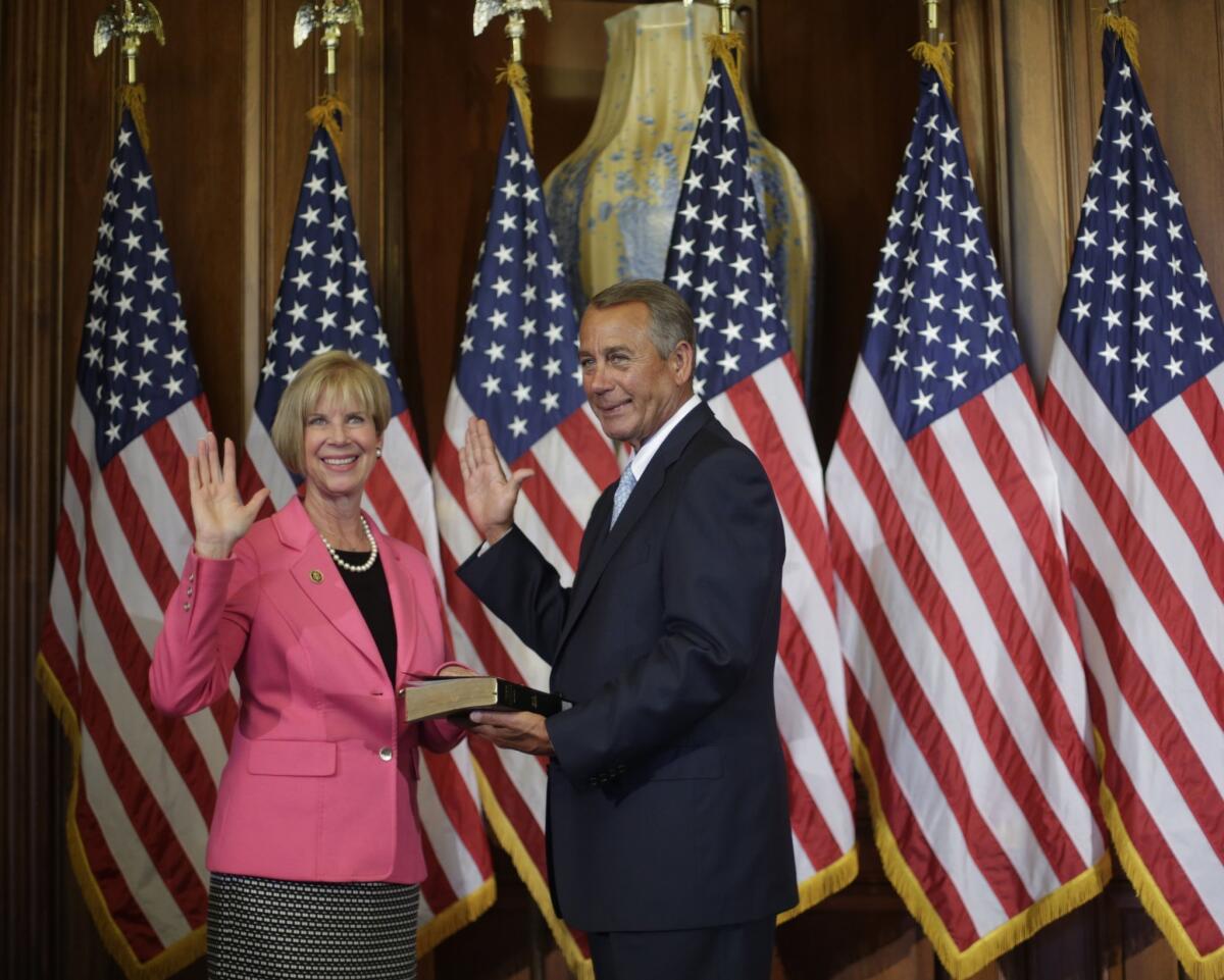 House Speaker John A. Boehner (R-Ohio) administers the oath of office to Rep. Janice Hahn (D-San Pedro) during a ceremonial reenactment last month.