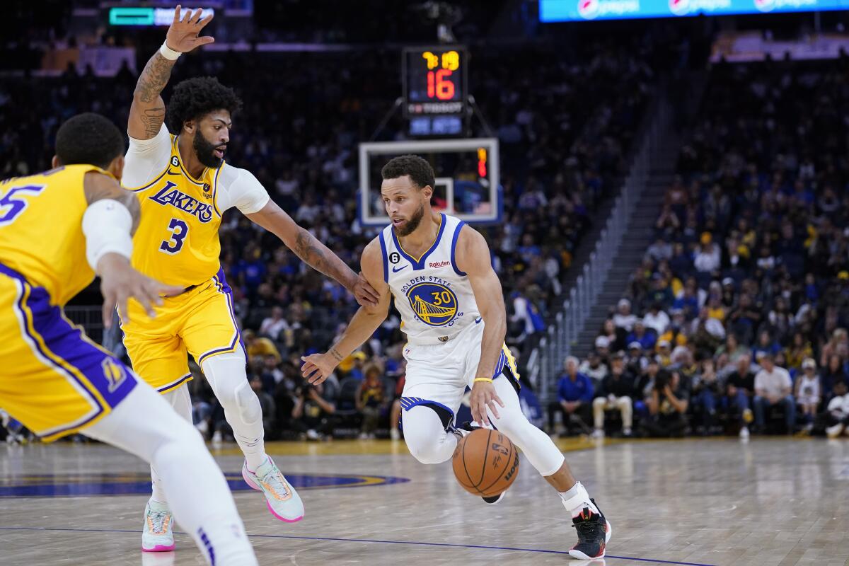 Davis, James deliver as Lakers top Curry, Warriors in Game 1 - The San  Diego Union-Tribune