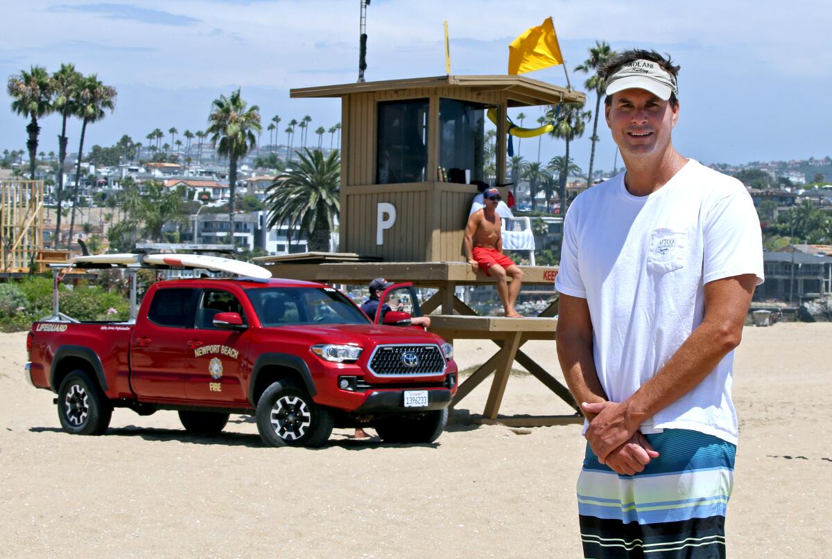 Eric Connella, 53, stands near Tower P at the Wedge in Newport Beach on Saturday. 