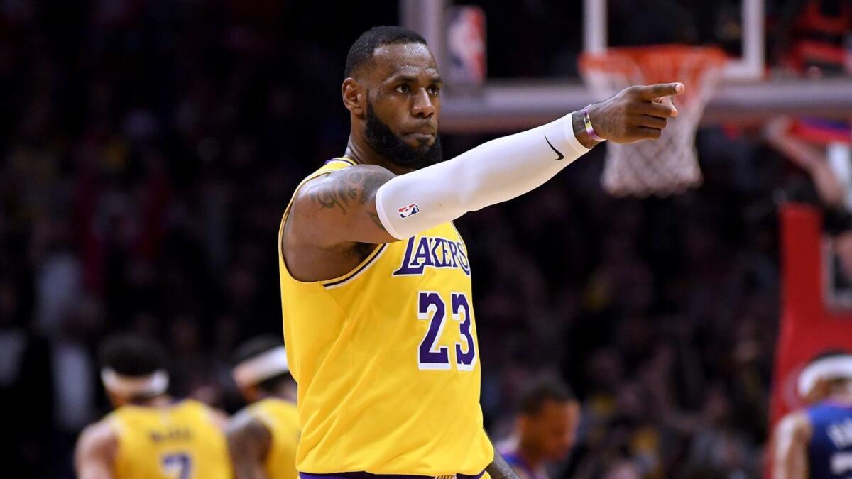 Lakers star LeBron James reacts during a game against the Clippers at Staples Center on Jan. 31. The Lakers have no problem selling tickets and making money despite missing the playoffs the last six seasons.