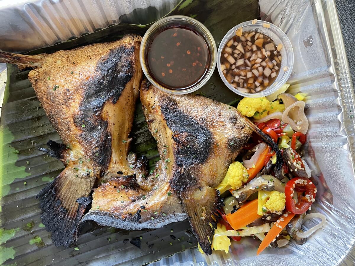 Overhead view of fish and sauces