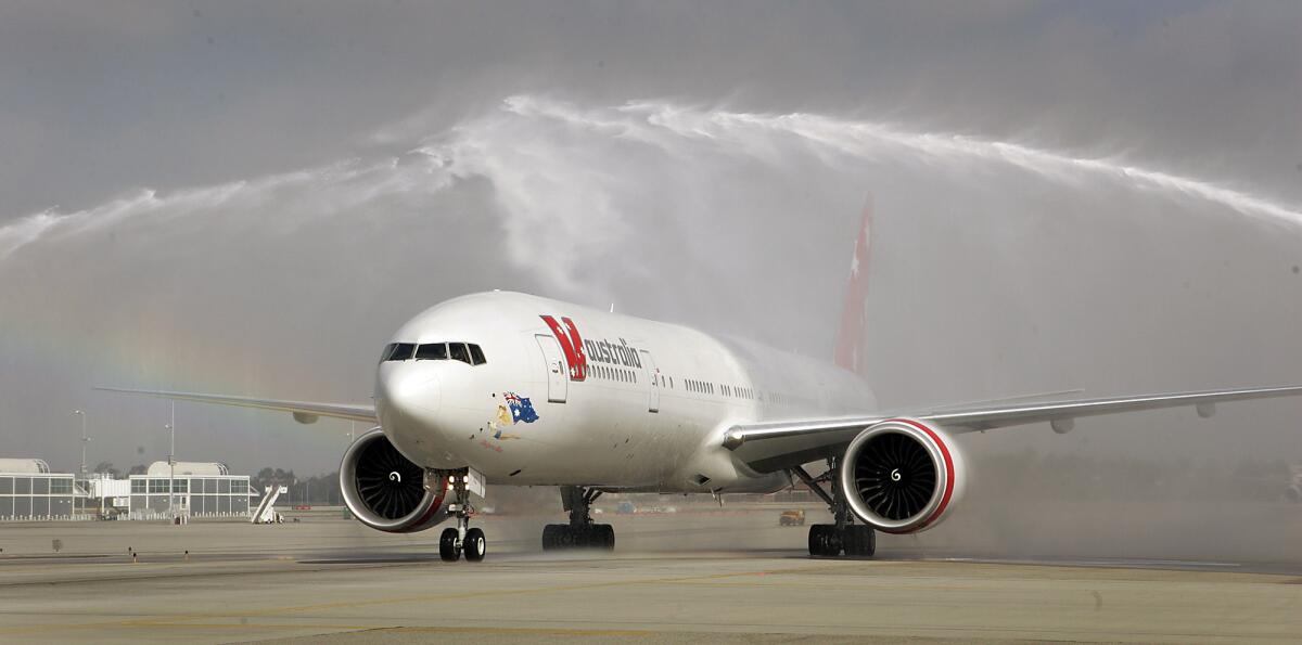 Fire department water cannons give a Virgin Australia Airlines Boeing 777 a celebratory shower as it taxis to the terminal after touching down on its inaugural flight from Sydney to Los Angeles in 2009.
