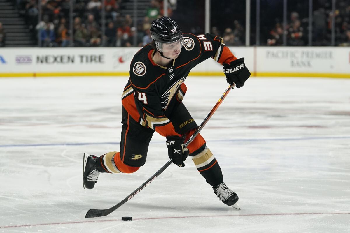 Anaheim Ducks defenseman Jamie Drysdale (34) shoots in a 2022 game.