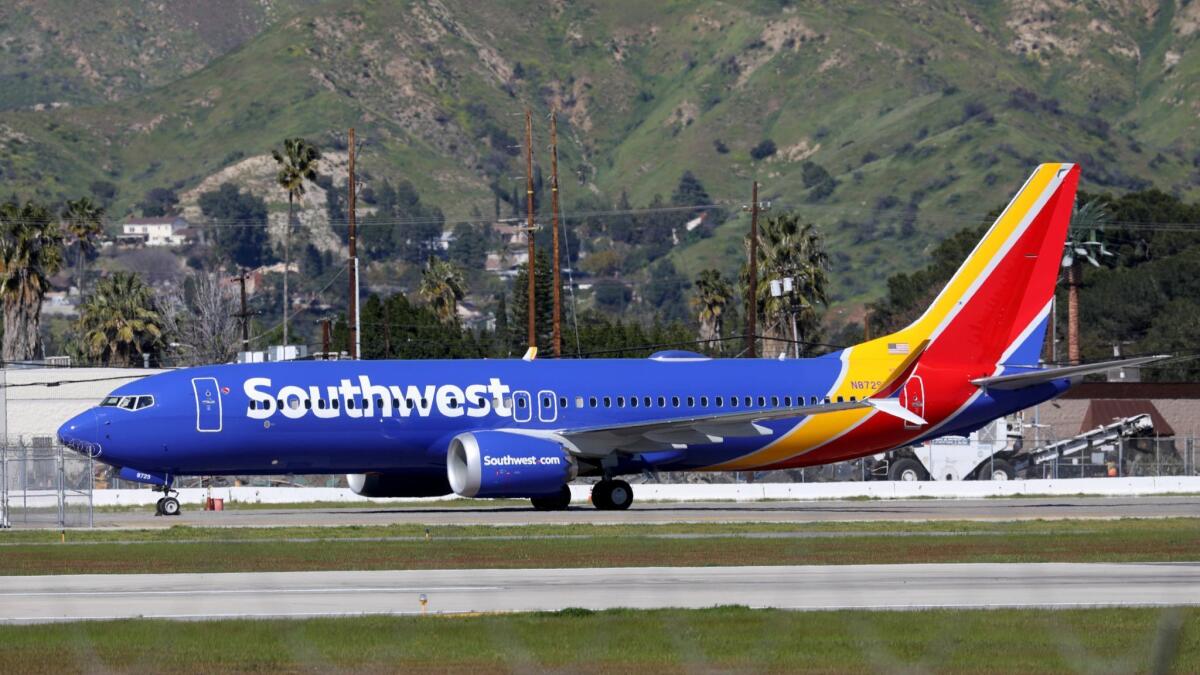 A Boeing 737 Max 8 flown by Southwest Airlines sits grounded at Hollywood Burbank Airport on Wednesday afternoon.