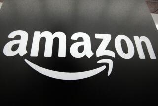 FILE - The Amazon logo is displayed, Jan. 23, 2023, at a Best Buy store in Pittsburgh. Amazon on Thursday, Oct. 26, reported strong revenue and profits from the summer months driven by growth in online sales and its advertising business. (AP Photo/Gene J. Puskar, File)
