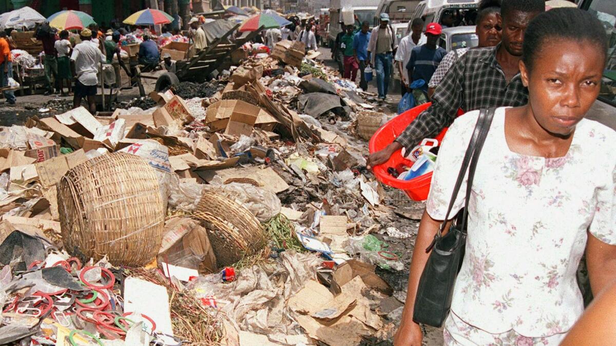 Garbage litters the street of Haiti's capital, Port-au-Prince, in this 2003 photo. Haiti is one of the poorest countries in the world.