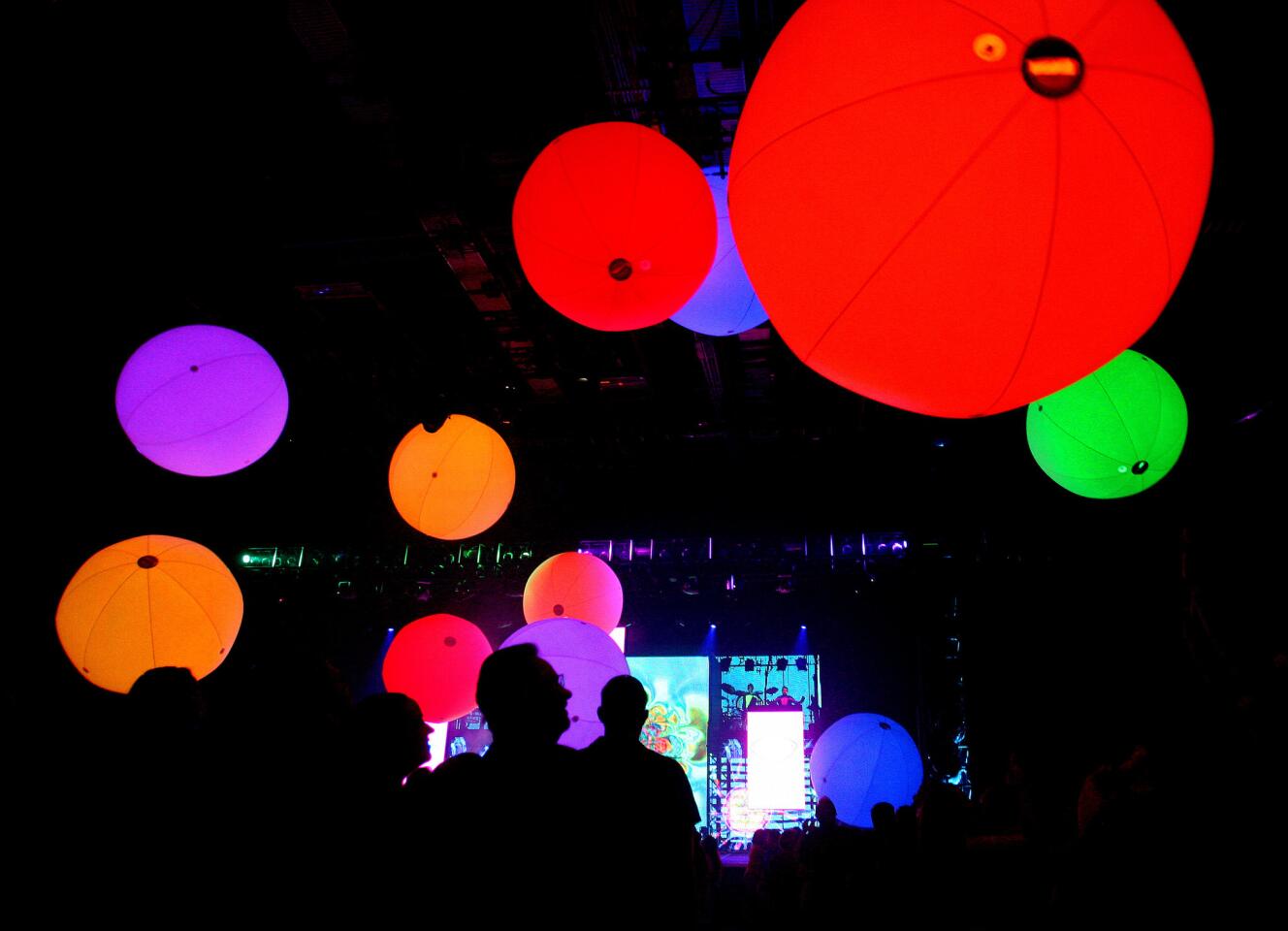 Giant colorful balls float onto the audience in the finale of the Blue Man Group's show-in-residence at Universal Orlando, during a media preview of the 2012 version of the interactive stage show, Thursday, February 16, 2012.