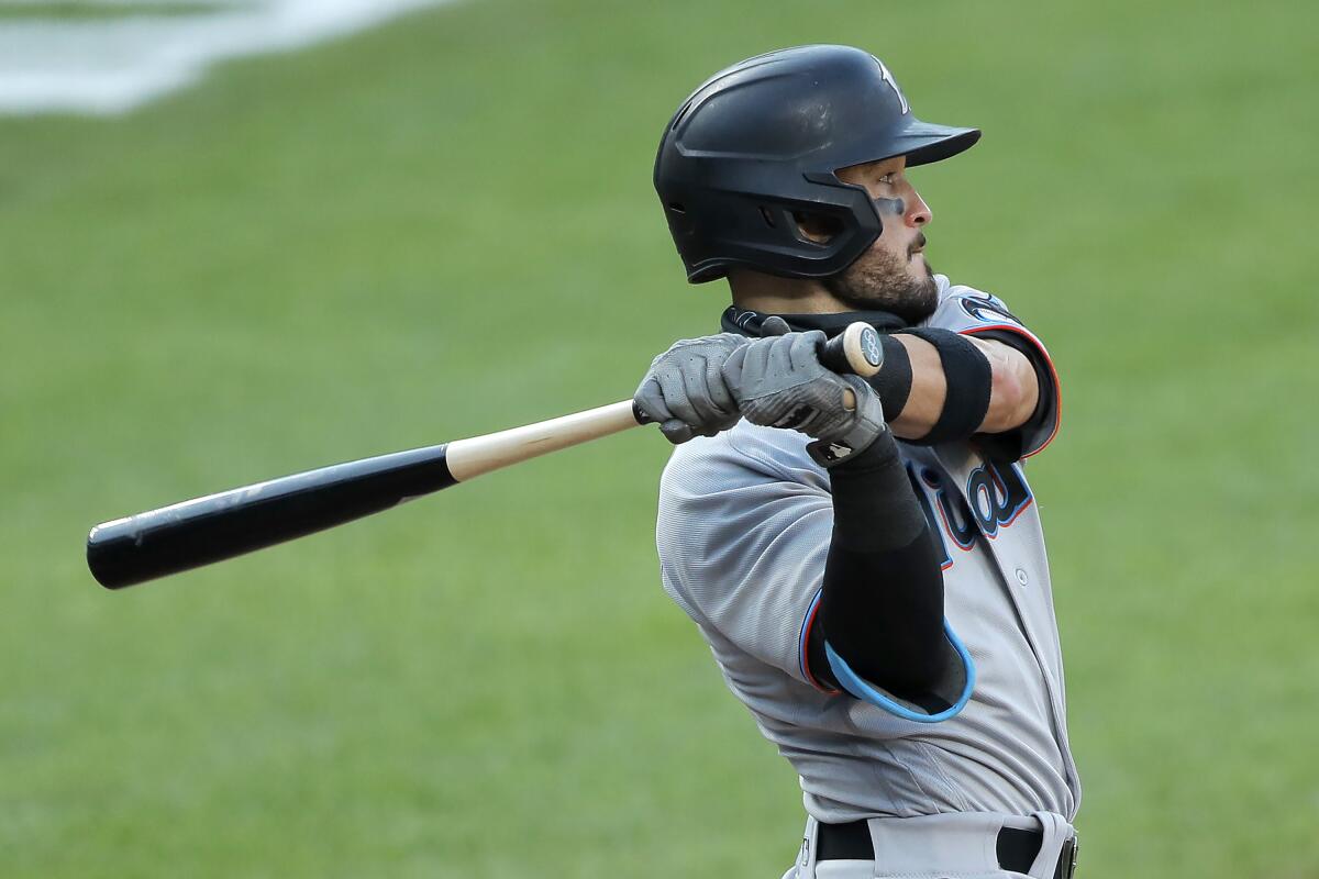 Miami Marlins' Eddy Alvarez swings at a pitch during a game against the Baltimore Orioles on Aug. 5. 