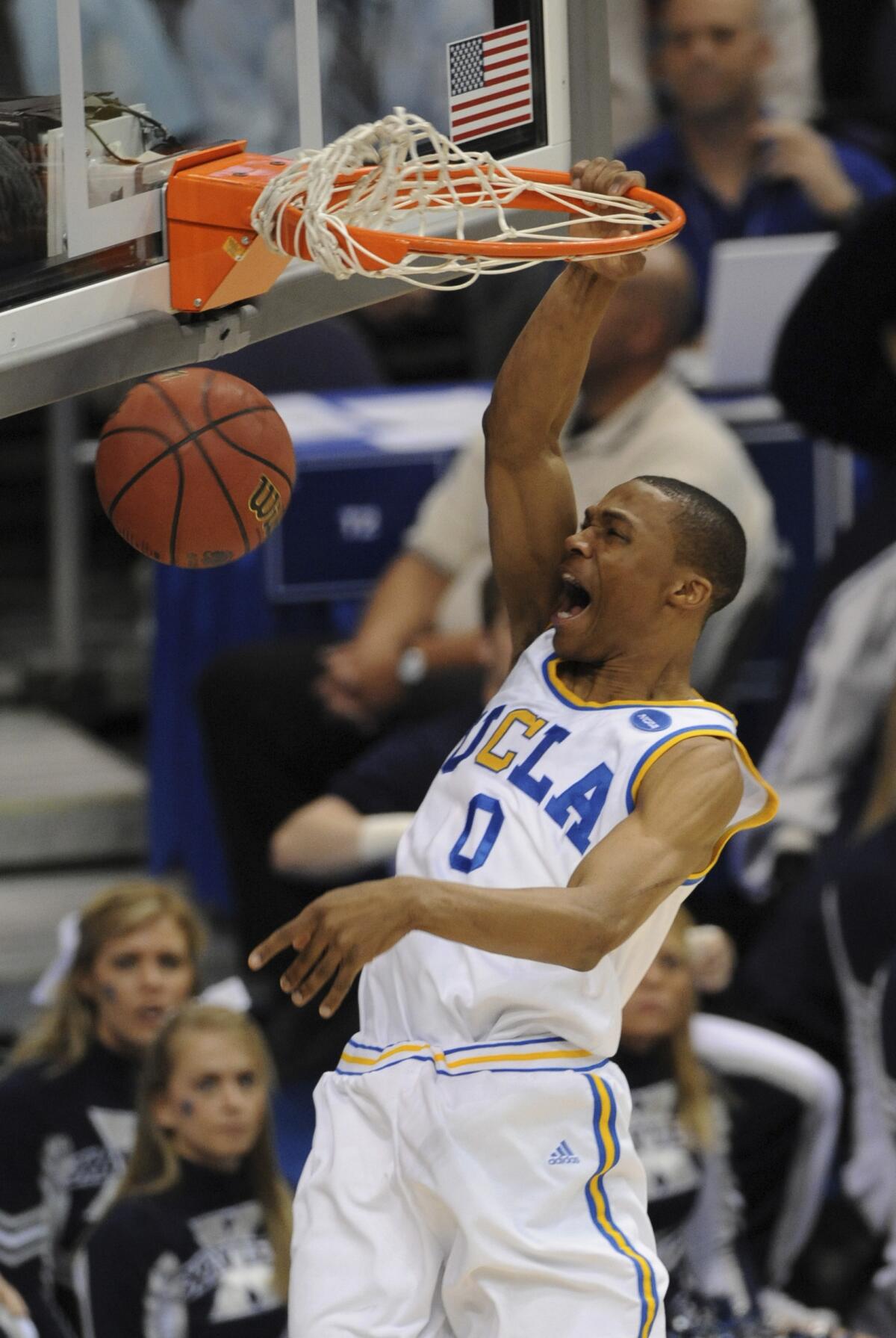 Los Angeles Lakers guard Russell Westbrook (0) dunks against the Washington  Wizards during the first half