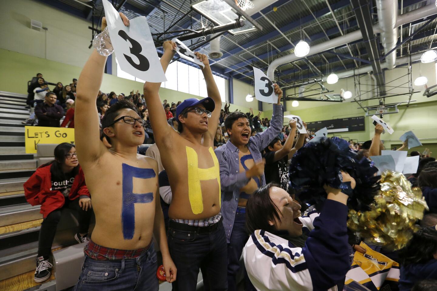 Franklin High School students cheer on their classmates during the Super Quiz portion the academic decathlon.