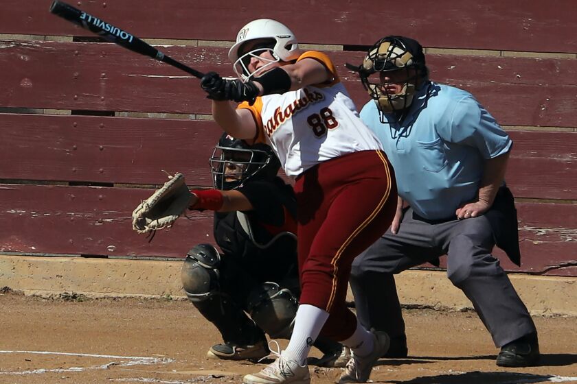 Ocean View's Sydney Fullbright (88) gets a hit during Garden Grove High School's girls' softball team against Ocean View High School's girls' softball team at Ocean View High School in Huntington Beach on Friday, April 7, 2023. (Photo by James Carbone)