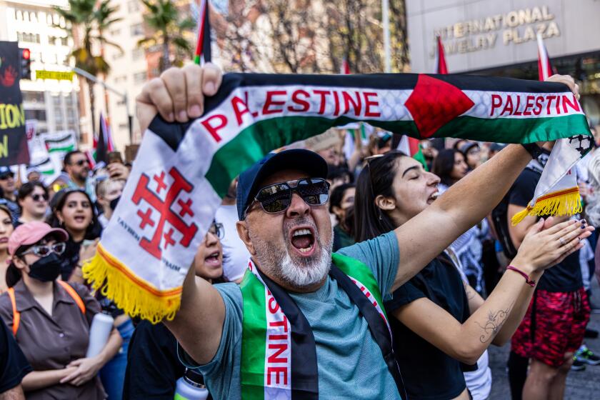 LOS ANGELES, CA - OCTOBER 21: Faiq Ady raises his voice in support during a Pro-Palestinian march to protest Israel's attacks on Gaza at a rally held at Pershing Square on Saturday, Oct. 21, 2023 in Los Angeles, CA. (Irfan Khan / Los Angeles Times)