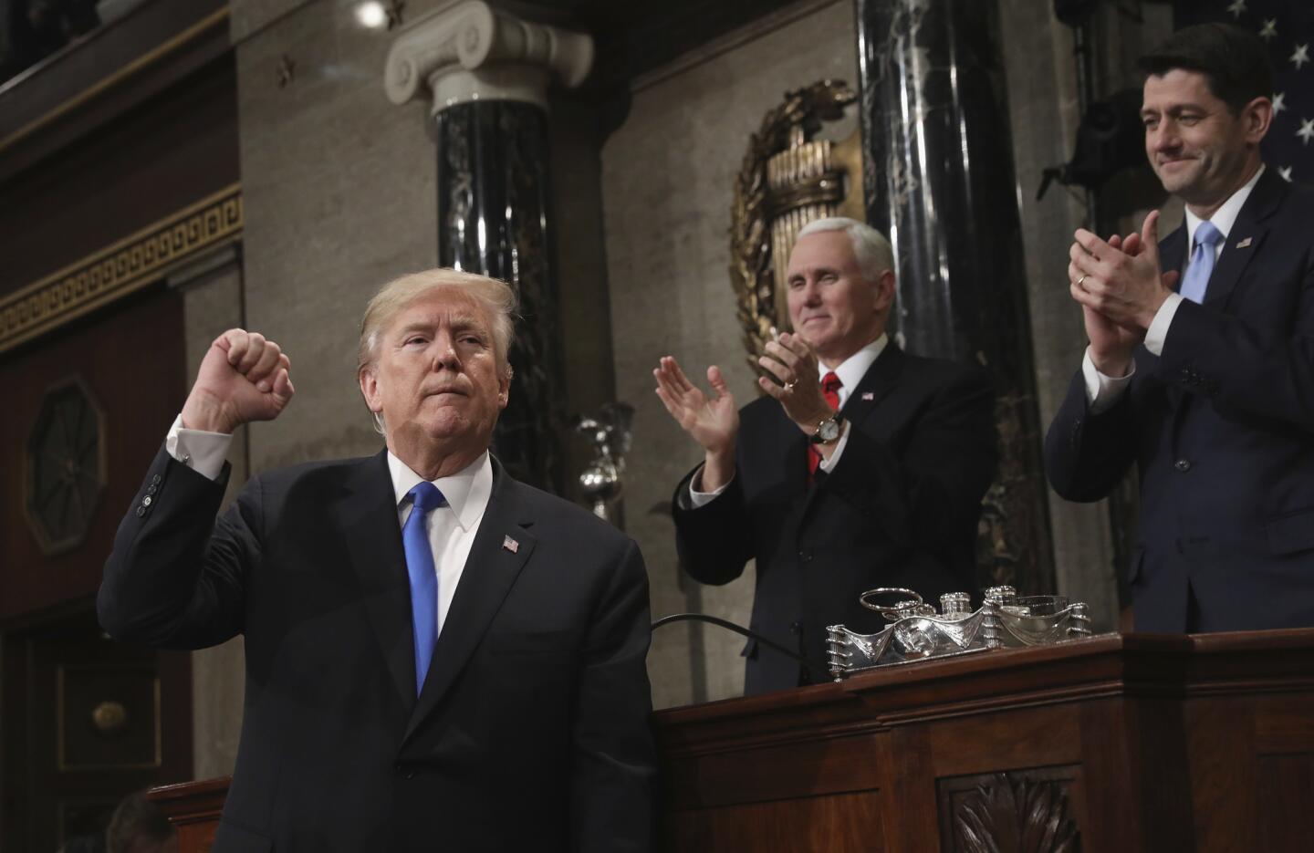 President Trump gestures as he finishes his first State of the Union address.