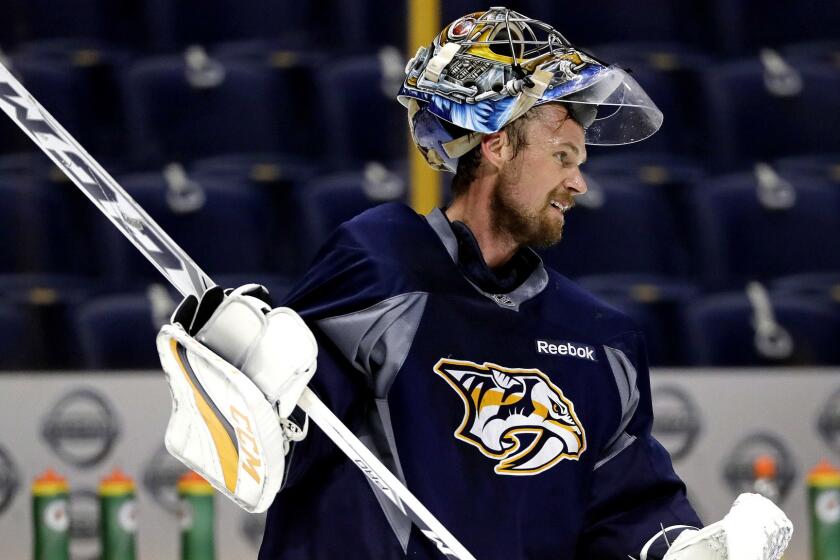 Nashville Predators goalie Pekka Rinne, of Finland, practices Friday, June 2, 2017, in Nashville, Tenn. The Predators are scheduled to face the Pittsburgh Penguins in Game 3 of the NHL hockey Stanley Cup Finals Saturday. (AP Photo/Mark Humphrey)