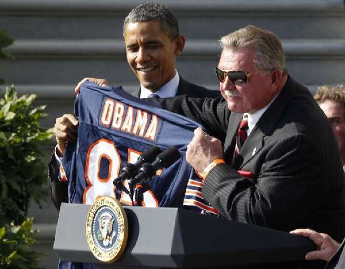 Mike Ditka, right, said he wished he had run against Barack Obama in 2004 for U.S. Senate in Illinois, because it could have meant Obama wouldn't be in the White House today.