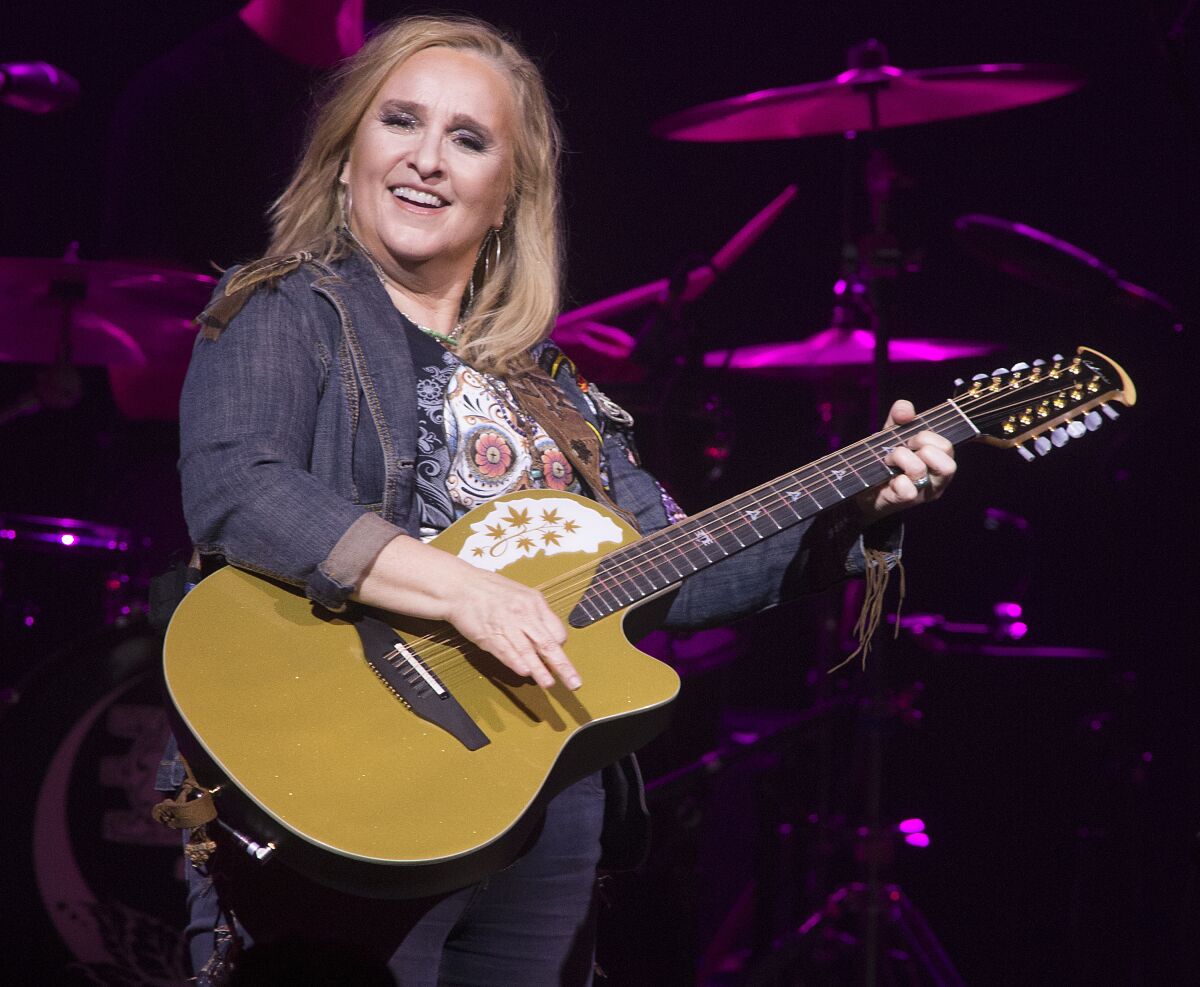 FILE - Melissa Etheridge performs in concert during her "Medicine Show Tour," at The American Music Theatre on Monday, May 6, 2019, in Lancaster, Pa. This year’s Love Rocks, which takes place at The Beacon Theatre in Manhattan Thursday night, March 10, 2022, boasts enormous star power – including headliners Etheridge, Keith Richards, with his “other” band The X-Pensive Winos, Mavis Staples, and others. Etheridge says the annual concert for the nonprofit God’s Love We Deliver, is exactly the kind of fundraiser she wanted to join. (Photo by Owen Sweeney/Invision/AP, File)
