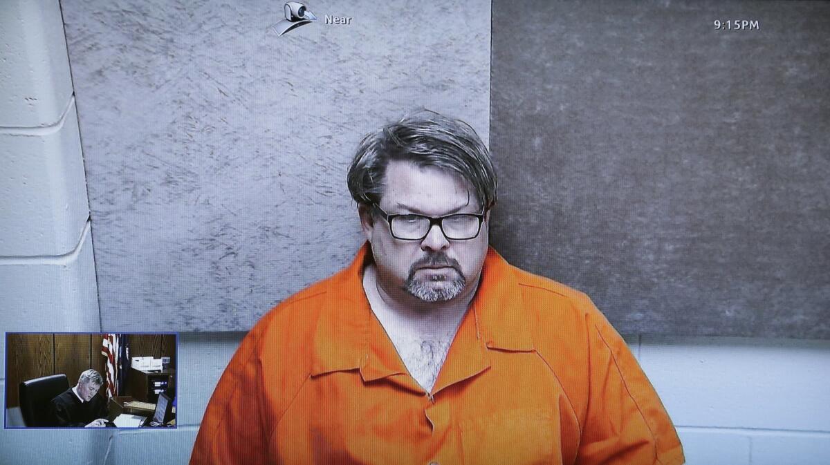 Uber driver Jason Dalton is arraigned via video Monday in the weekend shooting deaths of six people in Kalamazoo, Mich.