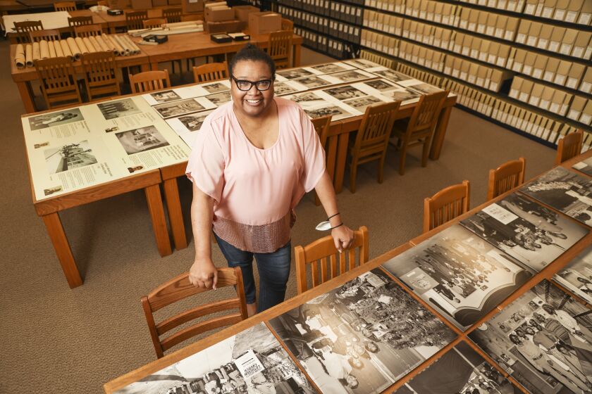 SAN DIEGO, CA - FEBRUARY 15: Marketing manager Shelby Gordon poses for photos at the San Diego History Center on Tuesday, Feb. 15, 2022 in San Diego, CA. (Eduardo Contreras / The San Diego Union-Tribune)
