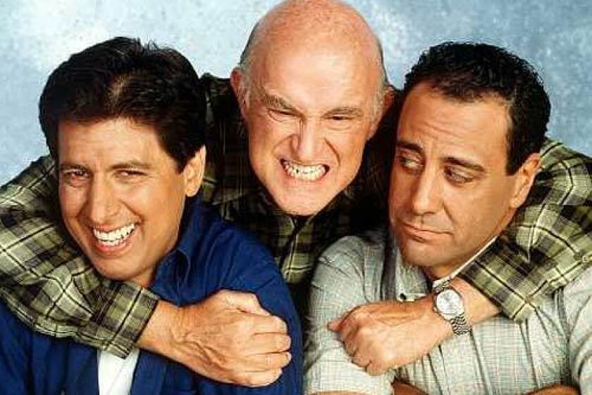 Cast members of "Everybody Loves Raymond," Ray Romano, left, with co-stars Peter Boyle, center, and Brad Garrett are shown in this 1998 file photo.