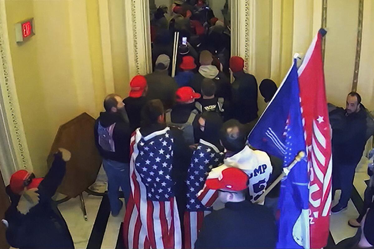 Capitol rioters shown in video