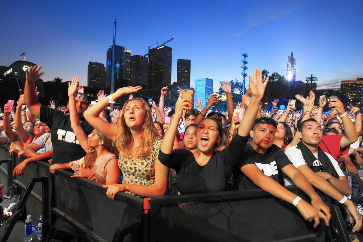 The crowd enjoys a performance at the Made in America festival Aug. 30 at Grand Park in downtown L.A. Mayor Eric Garcetti said the event provided a benefit to the city that exceeded any unreimbursed expenses.