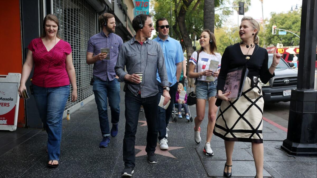 April Clemmer, right, leads a walking tour in Hollywood on March 19.