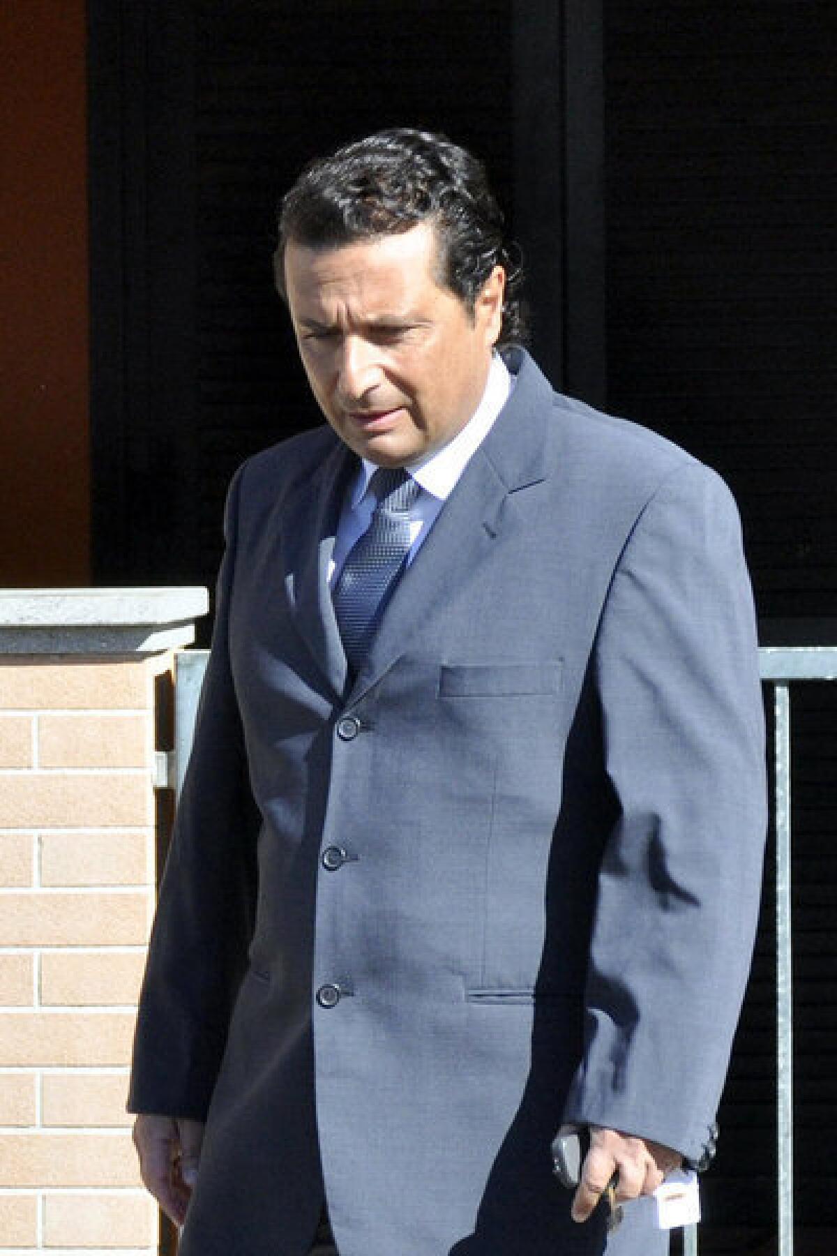 Francesco Schettino, the former captain of the Costa Concordia luxury cruise ship, leaves his house in the Italian city of Grosseto last week to attend a closed-door hearing.