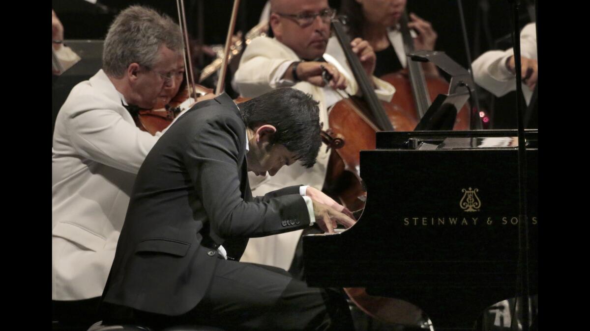 Behzod Abduraimov, a late replacement for Yefim Bronfman, shined with the L.A. Philharmonic.