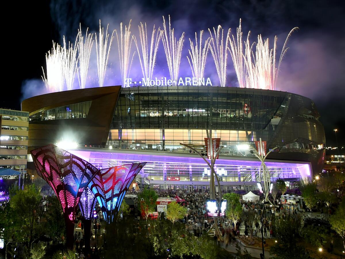 Fireworks explode over T-Mobile Arena during the venue's grand opening celebration on the Las Vegas Strip on April 6.
