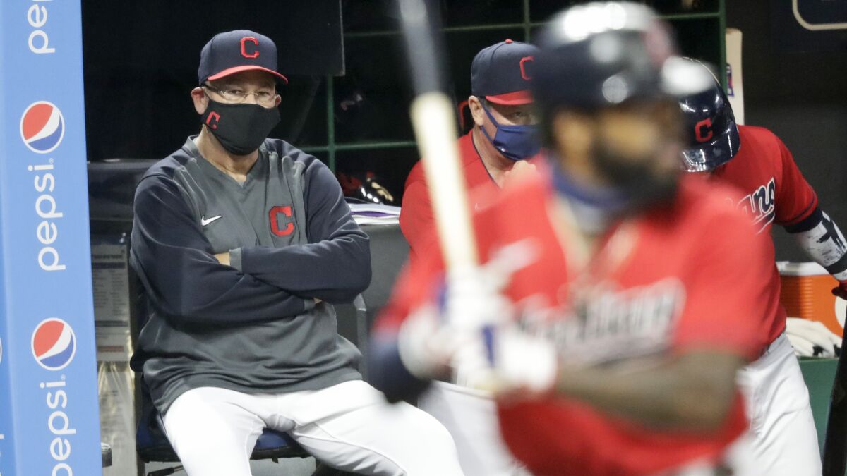 Cleveland Indians manager Terry Francona talks with general manager Chris  Antonetti during batting practice before the AL wild-card baseball game  against the Tampa Bay Rays on Wednesday, Oct. 2, 2013, in Cleveland. (