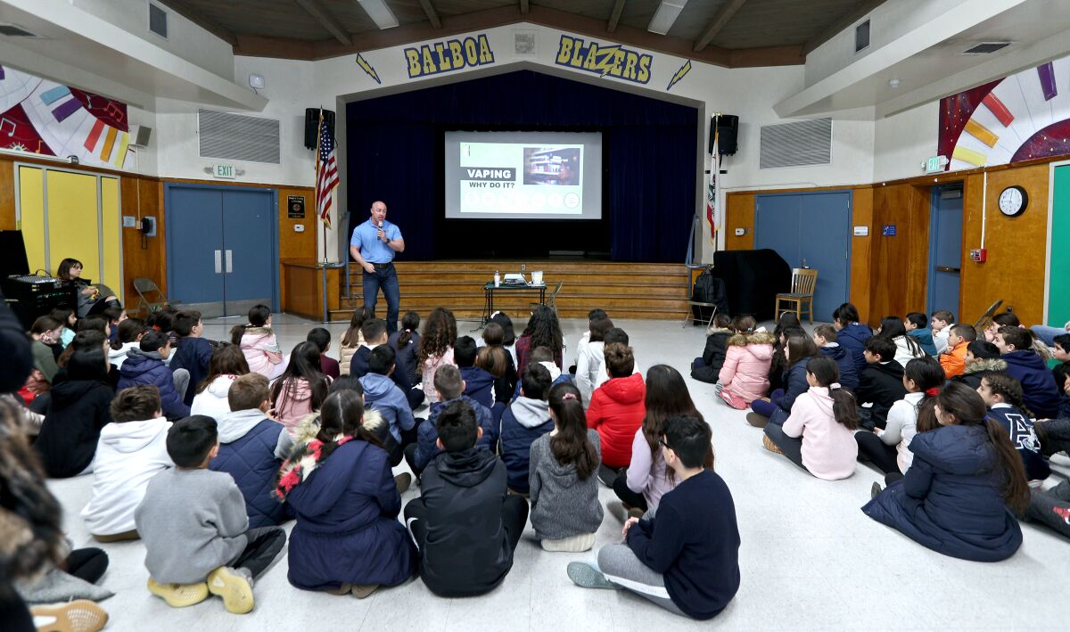 Al Hradecky from Impact Canine Solutions talked about vaping to fifth- and sixth-graders at Balboa Elementary School in Glendale on Wednesday.